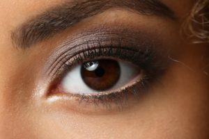 Woman's brown eye close up.